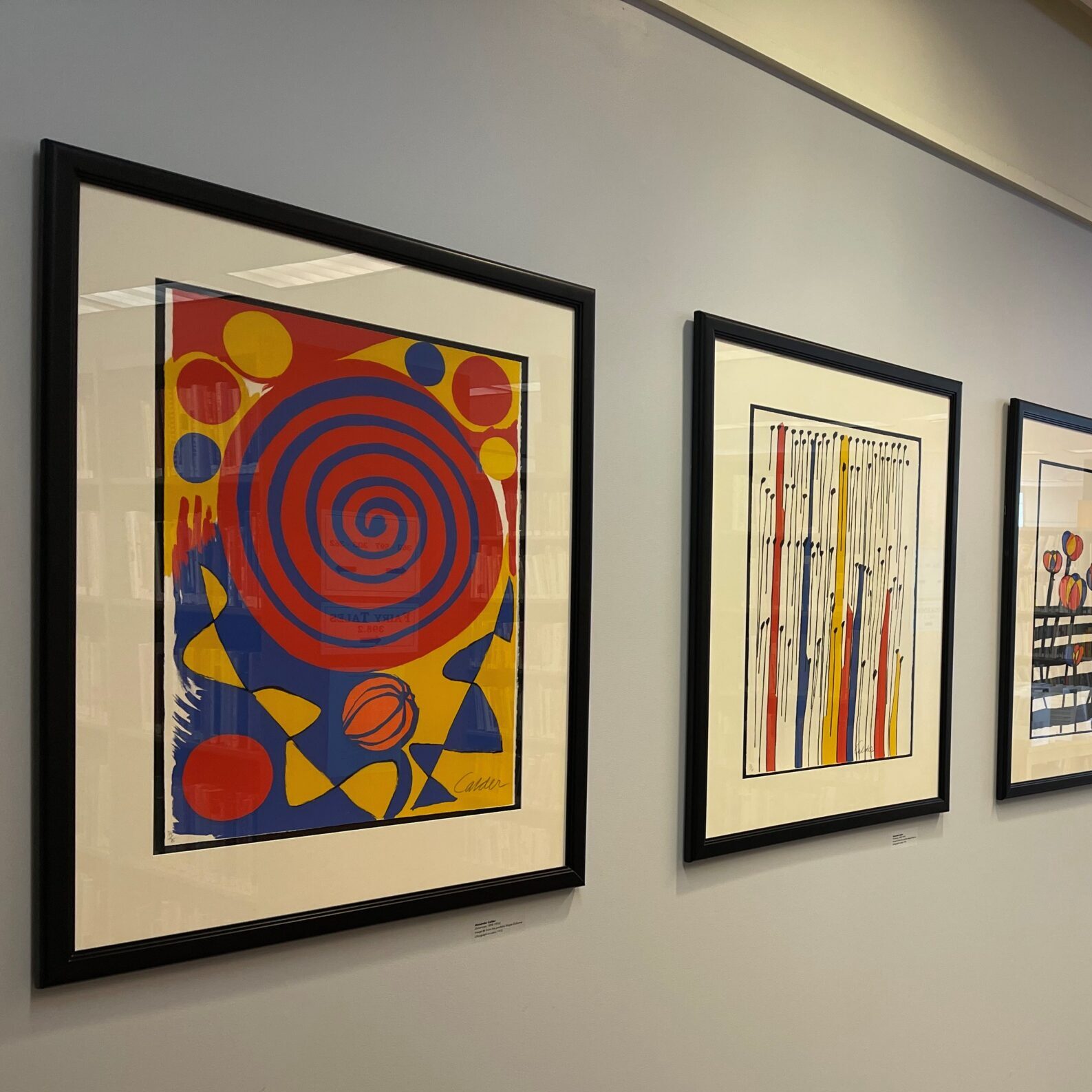 Calder prints on wall in nonfiction room