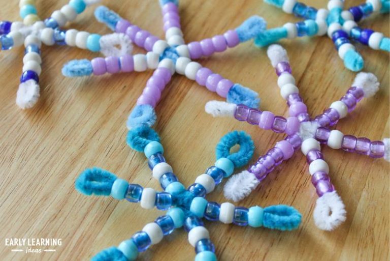 Image of pipe cleaners and beads in the shape of snowflakes.