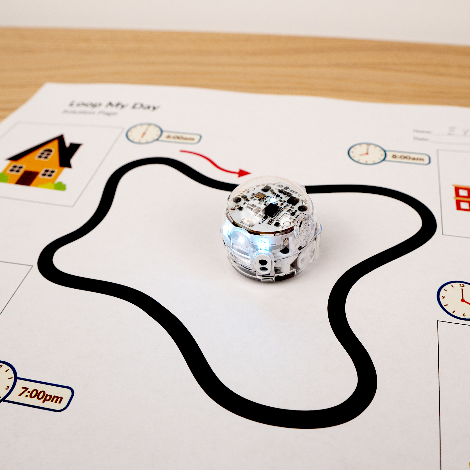 Small coding robot on a piece of paper